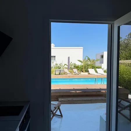 Minimal Cream Pool-front In * Parikia (Paros)